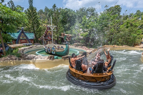 People on a river raft ride